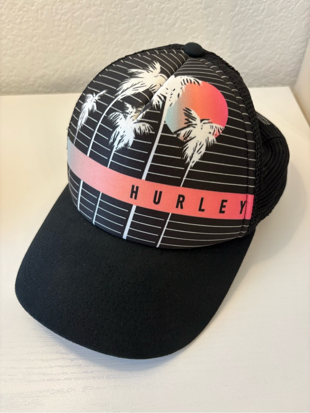 Hurley Black Trucker Hat with Pink Sunset Palm Graphic